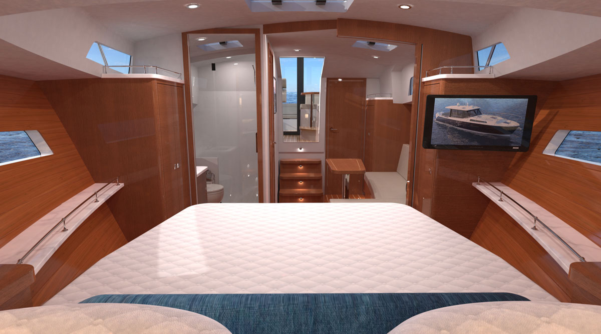 Extended hull and trunk cabin windows allow for plenty of ambient light to enter the spacious forepeak stateroom, here seen looking aft with the doors to both amidships suite and head in the open position. MJM 42 master stateroom